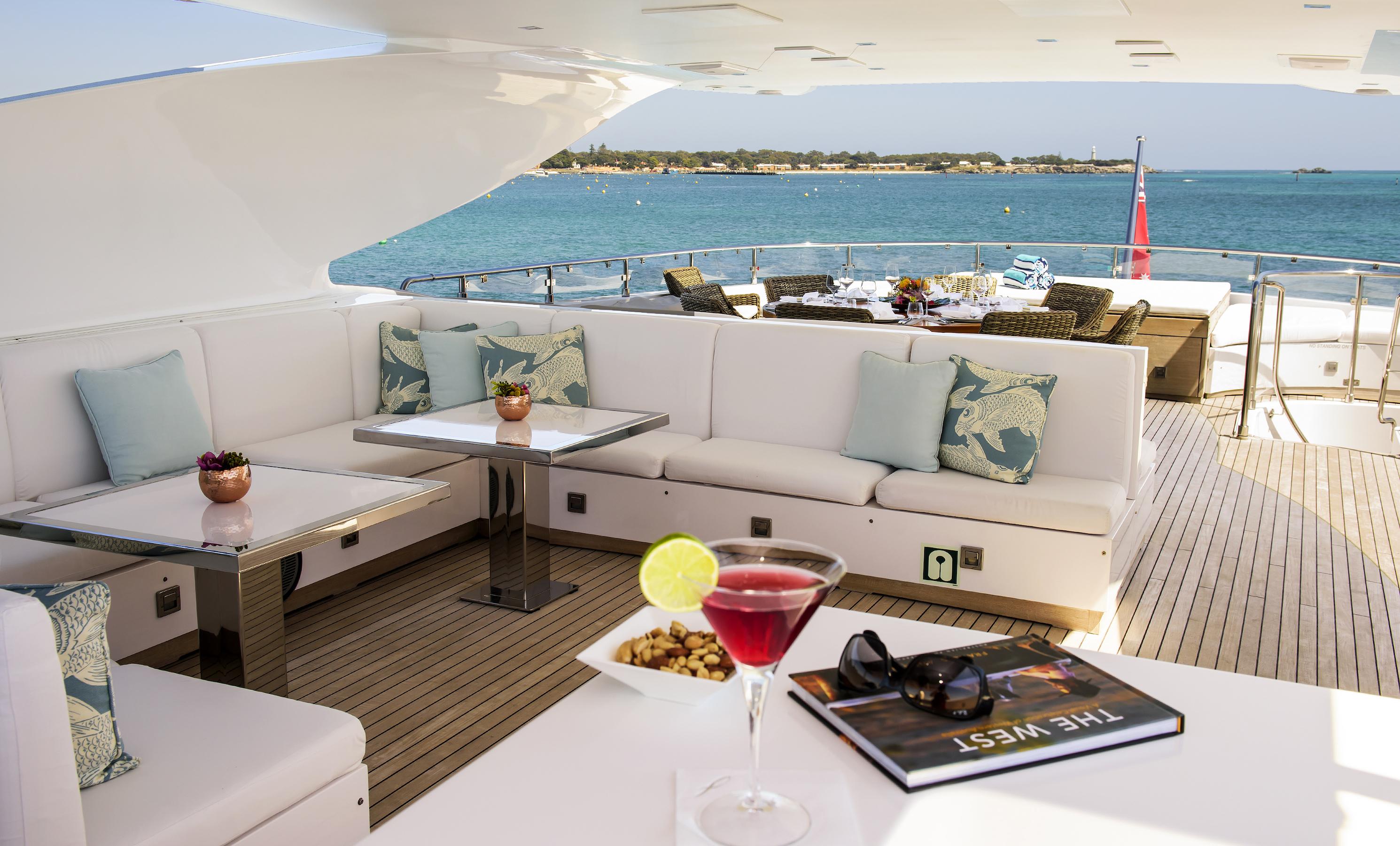 Super Yacht Charters on Infinity Pacific - enjoying the sun deck